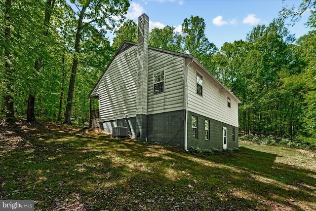 54 Courthouse Mountain Rd, Madison, VA 22727 - view of side of property with cooling unit, a chimney, and a lawn