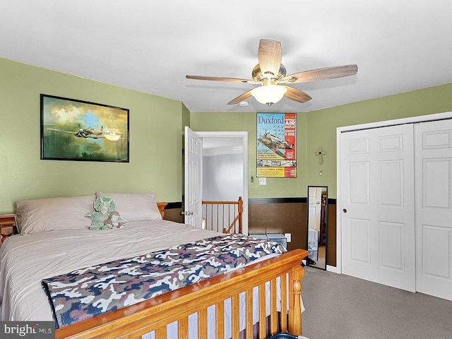  - bedroom with carpet floors, a closet, and ceiling fan