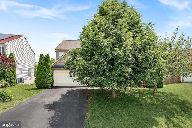 - obstructed view of property with driveway