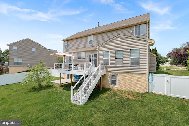  - rear view of property with a wooden deck and stairway