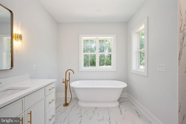8630 Rosni Way, Fredericksburg, VA 22407 - full bathroom featuring vanity, a freestanding tub, and marble look tiles