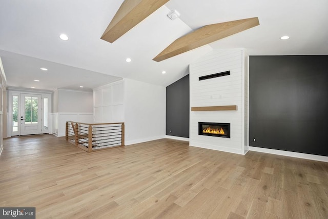 8630 Rosni Way, Fredericksburg, VA 22407 - unfurnished living room with recessed lighting, light wood-style flooring, and a large fireplace