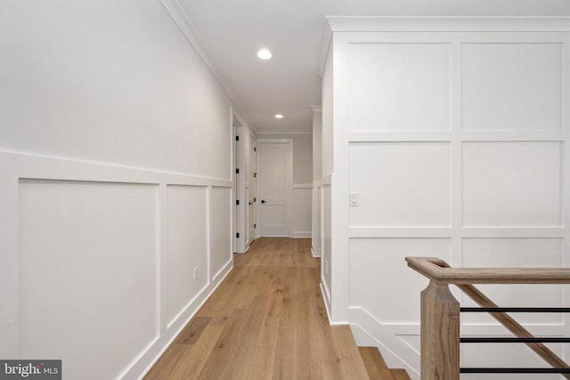 8630 Rosni Way, Fredericksburg, VA 22407 - corridor with a decorative wall, recessed lighting, light wood-style flooring, crown molding, and a wainscoted wall