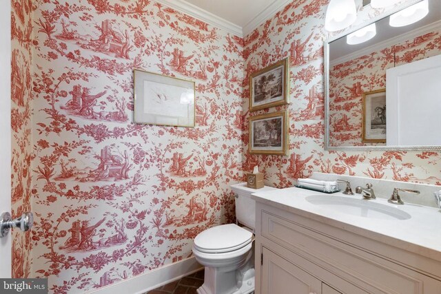  - bathroom with crown molding, wallpapered walls, and vanity