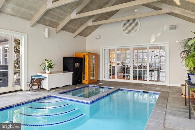  - view of swimming pool featuring a pool with connected hot tub