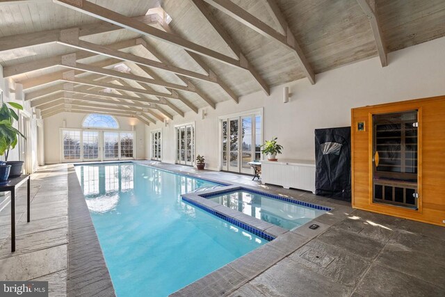  - view of pool featuring a pool with connected hot tub