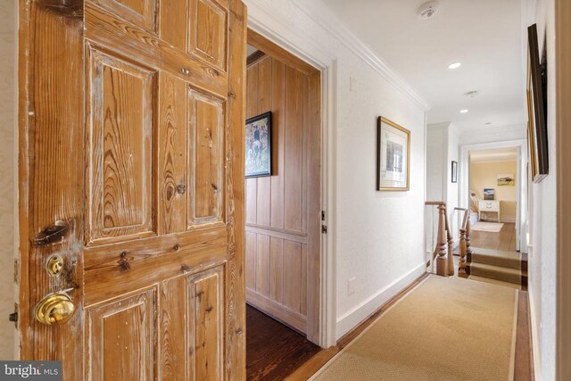  - corridor with ornamental molding, an upstairs landing, and recessed lighting