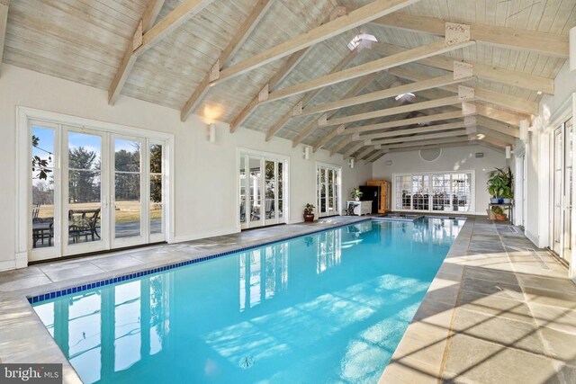  - indoor pool featuring french doors