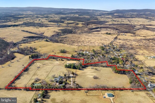  - view of rural area featuring a mountainous background and property parcel outlined