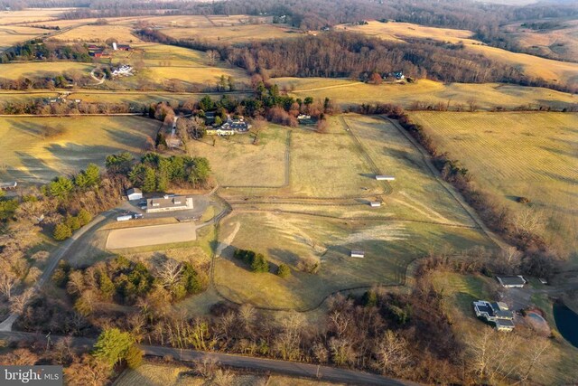  - aerial view of property and surrounding area with rural landscape