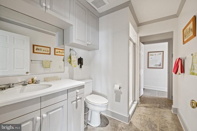  - bathroom featuring vanity, a stall shower, and crown molding