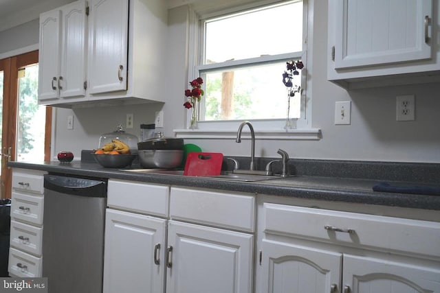 214 Culpeper St W, Culpeper, VA 22701 - kitchen with dishwasher, white cabinets, and dark countertops