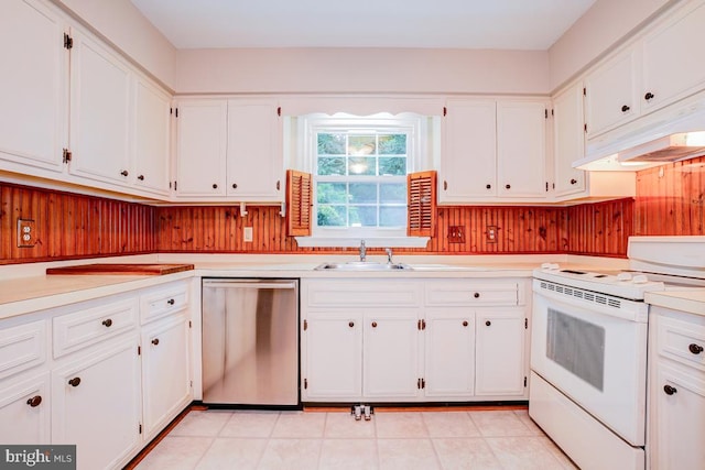  - kitchen featuring stainless steel dishwasher, white electric stove, white cabinets, and light countertops