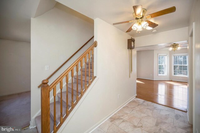 8128 Shirley Rd, Spotsylvania, VA 22551 - stairs featuring ceiling fan, baseboards, and marble finish flooring