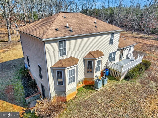 8128 Shirley Rd, Spotsylvania, VA 22551 - rear view of house featuring a wooden deck, a shingled roof, and central AC