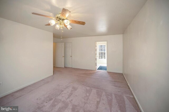 8128 Shirley Rd, Spotsylvania, VA 22551 - spare room with carpet flooring, ceiling fan, and baseboards