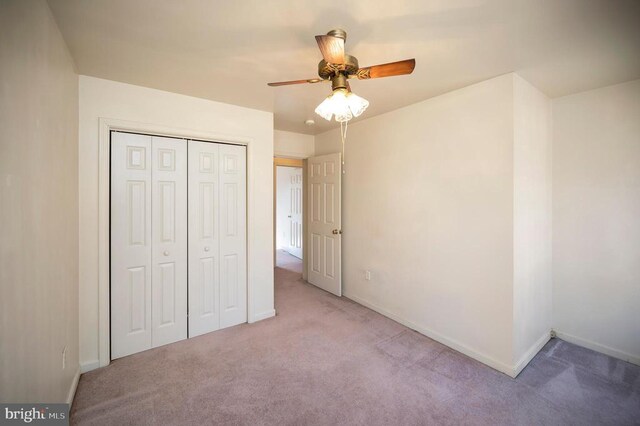 8128 Shirley Rd, Spotsylvania, VA 22551 - unfurnished bedroom featuring carpet, a closet, baseboards, and a ceiling fan