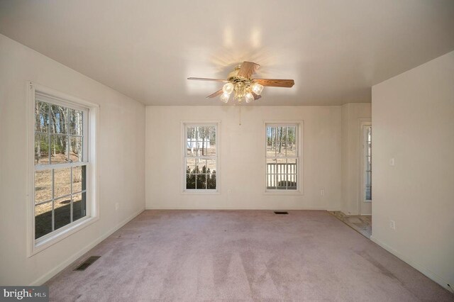 8128 Shirley Rd, Spotsylvania, VA 22551 - carpeted spare room featuring a ceiling fan and baseboards