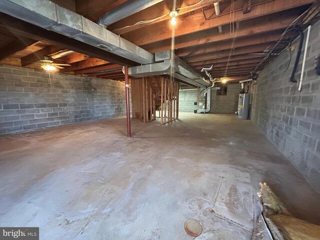  - unfinished below grade area featuring gas water heater