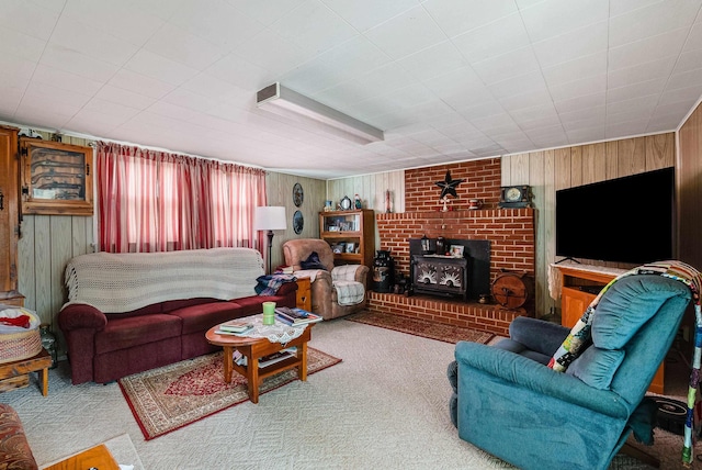 14335 S E Side Hwy, Grottoes, VA 24441 - carpeted living area with a wood stove and wood walls