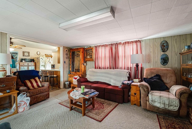 14335 S E Side Hwy, Grottoes, VA 24441 - carpeted living room featuring ceiling fan and wood walls