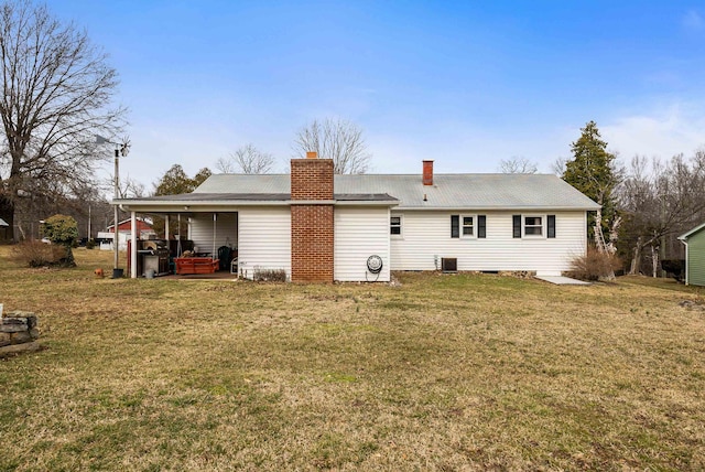 14335 S E Side Hwy, Grottoes, VA 24441 - back of property featuring central air condition unit, a chimney, and a lawn