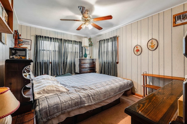 14335 S E Side Hwy, Grottoes, VA 24441 - carpeted bedroom featuring ceiling fan, wooden walls, baseboards, and ornamental molding