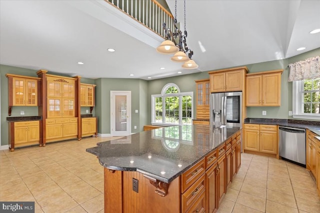 8606 Laroque Run Dr, Fredericksburg, VA 22407 - kitchen with appliances with stainless steel finishes, a center island, light tile patterned flooring, and recessed lighting
