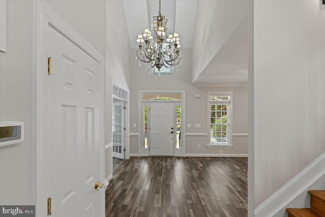8606 Laroque Run Dr, Fredericksburg, VA 22407 - entrance foyer with baseboards, dark wood-style flooring, an inviting chandelier, a towering ceiling, and stairway