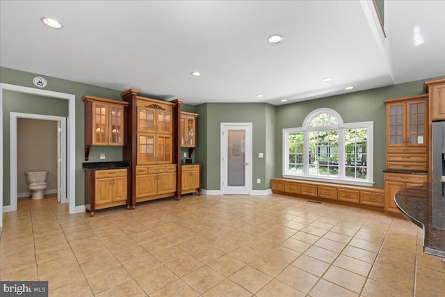 8606 Laroque Run Dr, Fredericksburg, VA 22407 - unfurnished living room featuring baseboards, light tile patterned floors, and recessed lighting