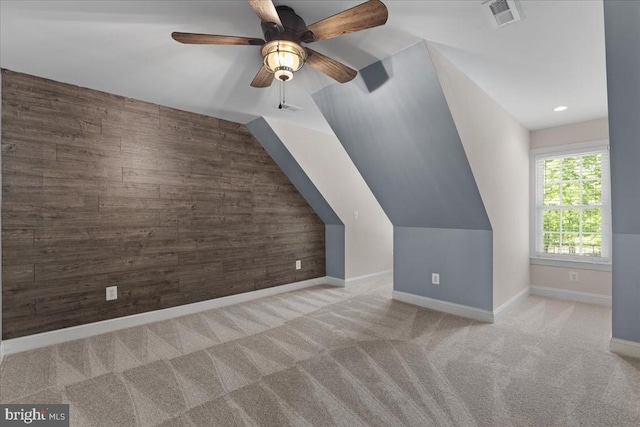 8606 Laroque Run Dr, Fredericksburg, VA 22407 - additional living space with baseboards, ceiling fan, visible vents, wooden walls, and carpet floors
