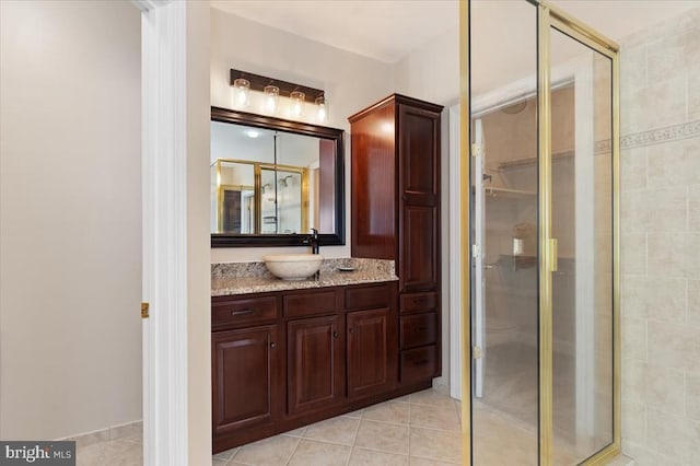 8606 Laroque Run Dr, Fredericksburg, VA 22407 - bathroom featuring tile patterned flooring, vanity, and tiled shower