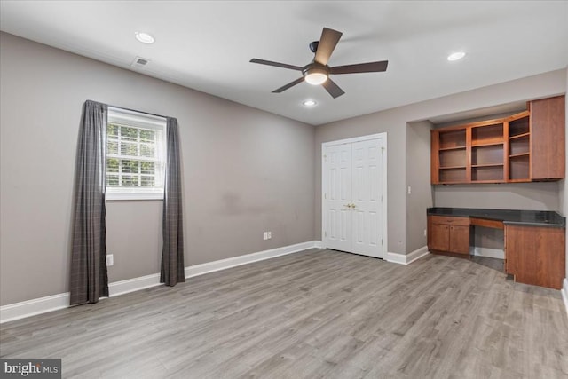 8606 Laroque Run Dr, Fredericksburg, VA 22407 - unfurnished office featuring baseboards, visible vents, ceiling fan, built in study area, and light wood-style floors