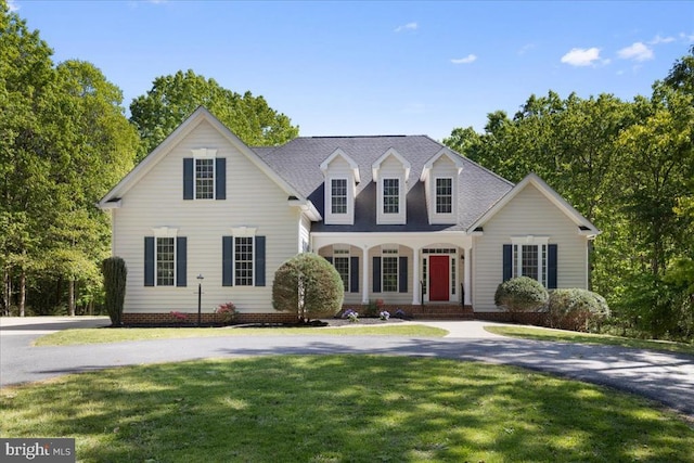 8606 Laroque Run Dr, Fredericksburg, VA 22407 - cape cod home featuring a front lawn, roof with shingles, and curved driveway