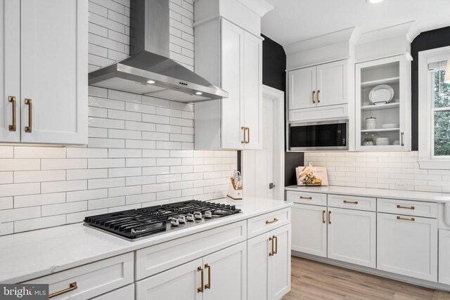 11302 Radcliff Ter, Spotsylvania, VA 22551 - kitchen featuring wall chimney exhaust hood, stainless steel appliances, light countertops, and recessed lighting