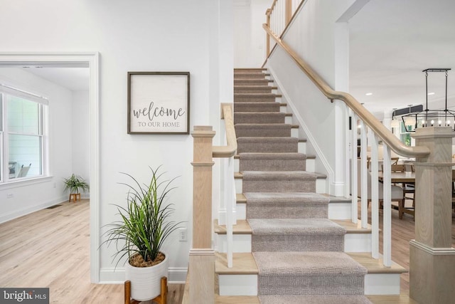 11302 Radcliff Ter, Spotsylvania, VA 22551 - stairs featuring wood finished floors and baseboards