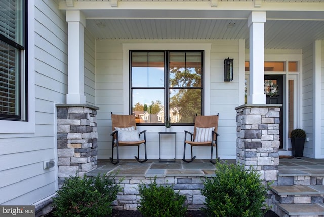 11302 Radcliff Ter, Spotsylvania, VA 22551 - view of exterior entry with a porch