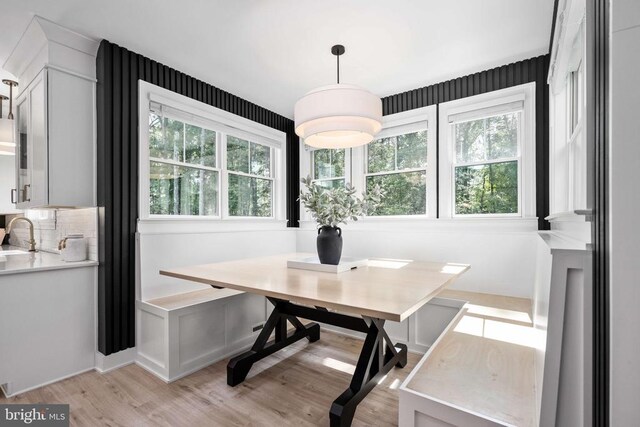 11302 Radcliff Ter, Spotsylvania, VA 22551 - dining room featuring light wood finished floors, healthy amount of natural light, and a desk