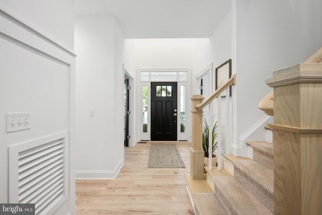 11302 Radcliff Ter, Spotsylvania, VA 22551 - entrance foyer featuring light wood-type flooring and stairway
