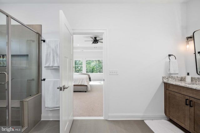 11302 Radcliff Ter, Spotsylvania, VA 22551 - full bathroom featuring vanity, ceiling fan, a stall shower, and connected bathroom
