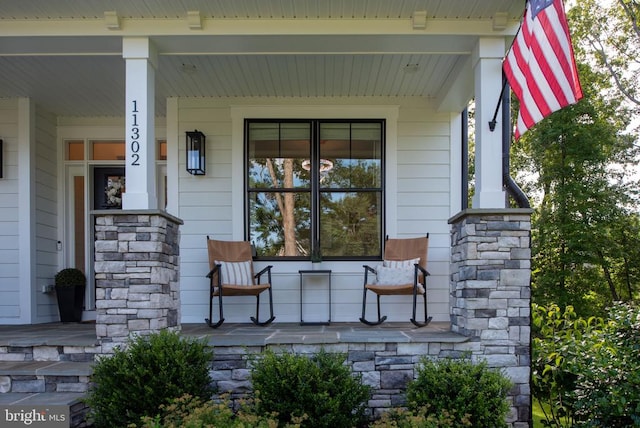 11302 Radcliff Ter, Spotsylvania, VA 22551 - entrance to property with covered porch and stone siding
