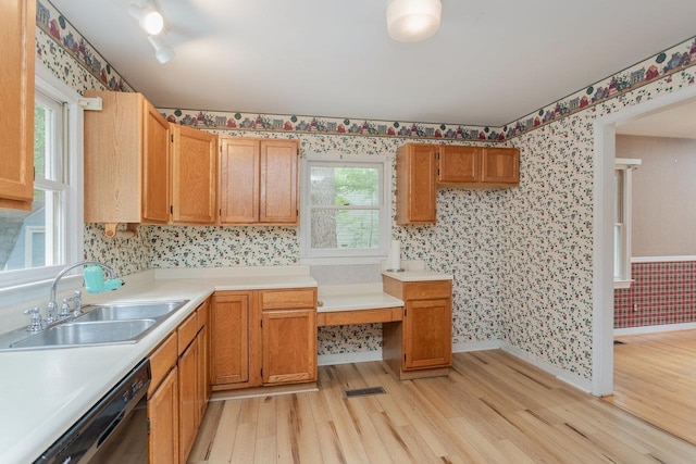 22 Loblolly Rd, Palmyra, VA 22963 - kitchen featuring black dishwasher, wallpapered walls, light wood-type flooring, light countertops, and brown cabinets
