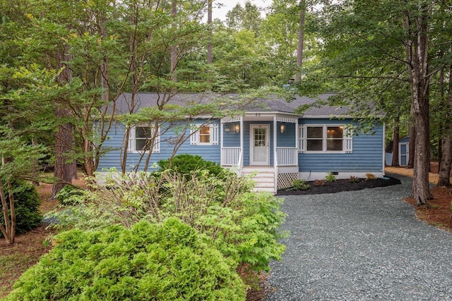 22 Loblolly Rd, Palmyra, VA 22963 - view of front of home featuring crawl space, a shed, a porch, and driveway