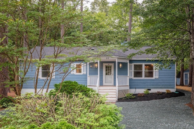 22 Loblolly Rd, Palmyra, VA 22963 - view of front of house with a porch, crawl space, and a shingled roof