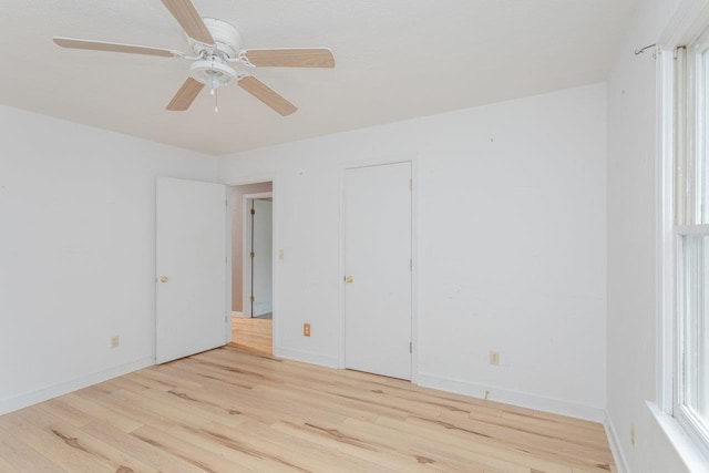 22 Loblolly Rd, Palmyra, VA 22963 - unfurnished bedroom with light wood-style floors and a ceiling fan
