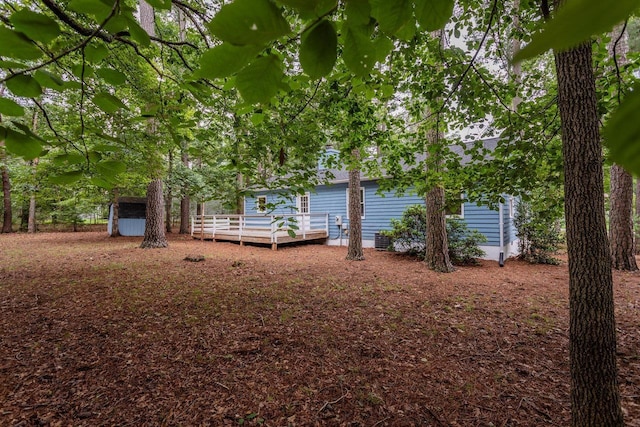 22 Loblolly Rd, Palmyra, VA 22963 - view of yard featuring a storage shed and a deck