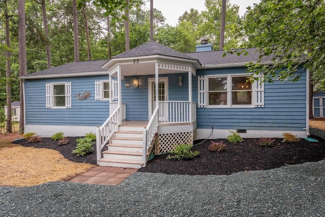 22 Loblolly Rd, Palmyra, VA 22963 - view of front facade featuring covered porch, crawl space, a chimney, and a shingled roof