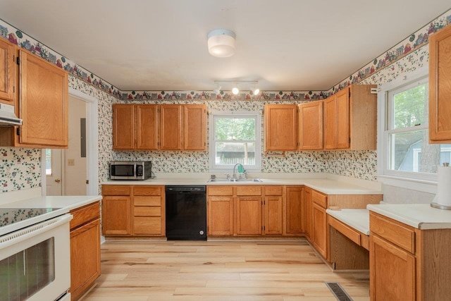22 Loblolly Rd, Palmyra, VA 22963 - kitchen featuring black dishwasher, wallpapered walls, stainless steel microwave, white electric stove, and light wood-style floors