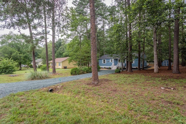 22 Loblolly Rd, Palmyra, VA 22963 - view of front of property with a front lawn, gravel driveway, and a storage unit