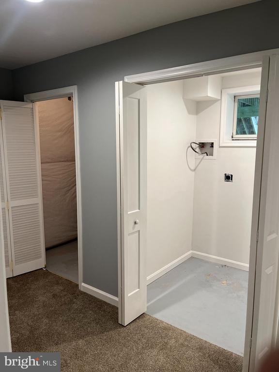 10214 Unique Trl, Rixeyville, VA 22737 - laundry area with hookup for a washing machine, hookup for an electric dryer, and carpet floors
